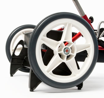 A stationary stand for the Rifton Tricycles enables individuals with special needs to have indoor therapy and exercise during the winter months