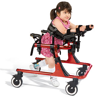 A young girl in a gait trainer with arm supports to help properly position her for walking
