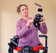 Cathy Ripmaster, MS, PT demonstrates how to adjust the arm promts on the Rifton Pacer gait trainer